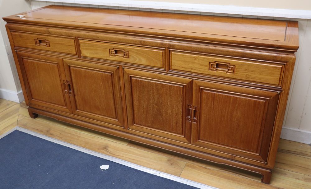 A Chinese hardwood sideboard, width 182cm, depth 48cm, height 82cm